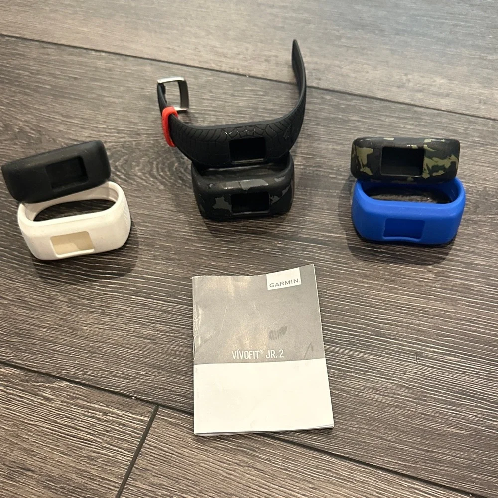 Garmin vívofit jr. 2 Smartwatch Cases in Black, White, Camo, and Blue